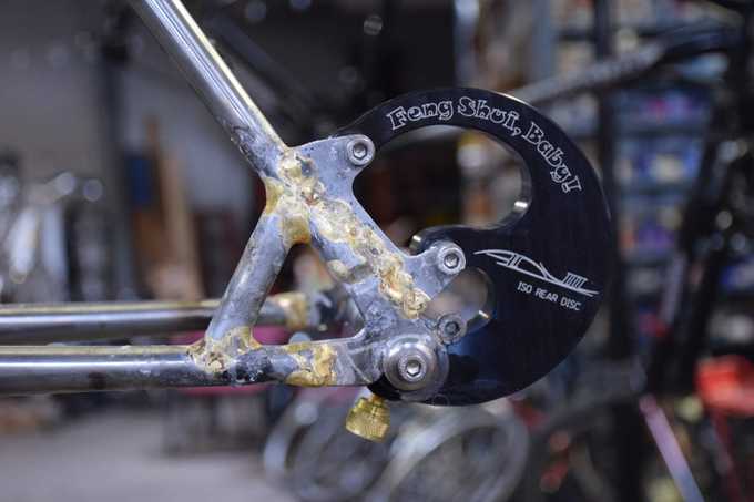 Disc brake tab attachment with Anvil Feng Shui